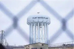  ?? AP FILE ?? In dismissing charges in the Flint water scandal, Judge Elizabeth Kelly rejected efforts to just send the cases to Flint District Court and turn them into criminal complaints. “Simply put, there are no valid charges,” Kelly said.