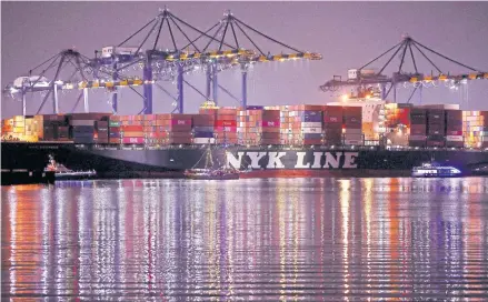  ?? AFP ?? A ship is seen loaded with shipping containers at the Port of Los Angeles, California, the United States early last month.