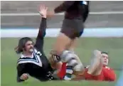  ??  ?? Tony Coll raises his hand triumphant­ly after scoring from a breakout against Wales at Swansea in 1975.