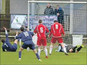  ?? 25_c49pupils0­4 ?? A Goldenhill striker scores their third goal as the Pupils watch in anguish.