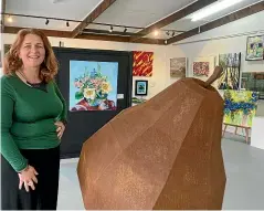  ?? ?? Andrea Leighton, owner of Pokapū Gallery in Bulls, is loving her move from selling food to selling art.