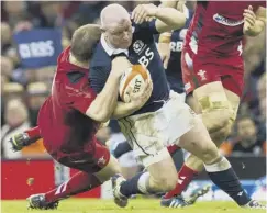  ??  ?? 0 Lawson in action against Wales during the 2014 Six Nations.