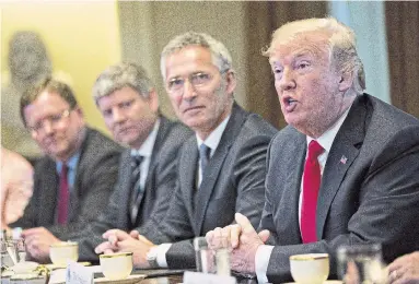  ?? POOL/GETTY IMAGES ?? U.S. President Donald Trump wants NATO member countries to spend at least 2 per cent of their gross domestic product on defence. In 2017, Canada spent just 1.29 per cent of its GDP on defence.