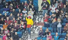  ?? JULIE JOCSAK THE ST. CATHARINES STANDARD ?? A woman sells 50/50 tickets at a Niagara IceDogs game at Meridian Centre in January.