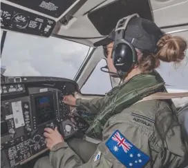  ?? Gemma Dorn at the controls of a KA350 King Air off the coast of Malaysia. ??