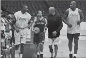  ?? Chris Gardner Associated Press ?? TYRONN LUE, with ball, learned with Lakers, from left, Horace Grant, Ron Harper and Shaquille O’Neal.