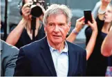  ??  ?? In this file photo, Harrison Ford greets fans during a Star Wars fan event in Sydney, Australia. — AP