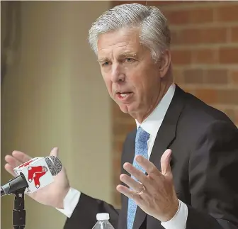  ?? STAFF PHOTO BY NANCY LANE ?? TALKING HEAD: Dave Dombrowski meets the press yesterday at Fenway Park.