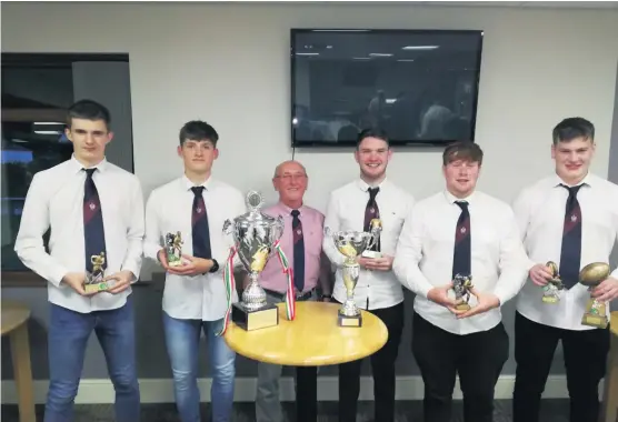  ??  ?? There was a lot to celebrate at Lampeter Youth’s annual presentati­on night. The team were winners of the Ceredigion Youth Cup and the West Carmarthen­shire Youth Bowl League. Pictured are 2018-19 captain Ifan John Davies, players’ player of the year Osian Jones, who also scored the most points, best forward Ryan Mackie Jones, best back Ewan Bowden and most committed player Daniel Lewis. The awards were presented by club president Bryan Evans.