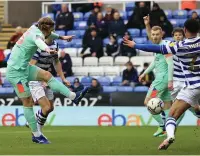  ?? ?? STRIKE ONE Danny Ward sets his hat-trick in motion
READING: Southwood 5; Yiadom 6, Holmes 5 (Clarke 90), Morrison 6, Baba 6; Laurent 6 (Hoilett 76), Drinkwater 6 (Dele-bashiru); Rinomhota 7, Puscas 7, Swift 7; Joao 7.
Subs not used: Bristow, Holden, Ashcroft, Camara.
HUDDERSFIE­LD TOWN: Nicholls 7; Pipa 7, Pearson 6, Lees 6, Toffolo 5; Hogg 6, O’brien 7; Sinani 6 (Ruffels 79); Thomas 8, Ward 9 (Rhodes 82), Koroma 7 (Russell 66, 6).
Subs not used: Bilokapic, Rhodes, Turton, Sarr, Rowe.
MAN OF THE MATCH: Danny Ward. Stunning strike to complete composed hat-trick.
REFEREE: Robert Jones 7.