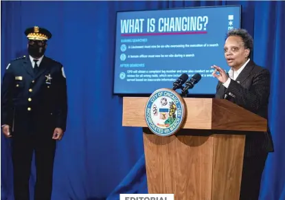  ?? PAT NABONG/SUN-TIMES ?? Mayor Lori Lightfoot speaks Wednesday at City Hall, where she and Police Supt. David Brown announced reforms in how search warrants are approved, planned, carried out and reviewed following the botched raid on Anjanette Young’s home in 2019.