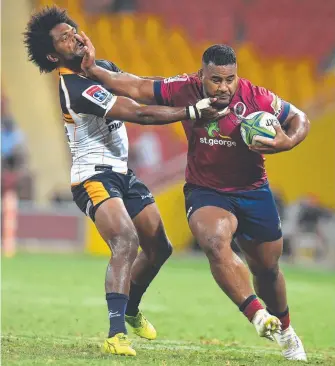  ?? Picture: AAP IMAGE ?? The Reds’ Taniela Tupou fends off Brumbies winger Henry Speight.