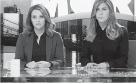  ?? APPLE TV+ ?? Reese Witherspoo­n, left, and Jennifer Aniston in “The Morning Show.”