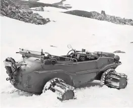  ??  ?? Above right: All-wheeldrive Type 166 leant itself to use in all situations! Bolt-on paddles allowed the vehicle to traverse deep snow