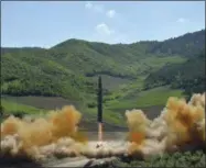  ?? KOREAN CENTRAL NEWS AGENCY — KOREA NEWS SERVICE ?? FILE- In this July 4, 2017 file photo, distribute­d by the North Korean government shows what was said to be the launch of a Hwasong-14 interconti­nental ballistic missile in North Korea. North Korea fired a ballistic missile Friday night, July 28, which...