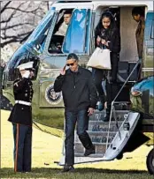  ?? RON SACHS/CONSOLIDAT­ED NEWS PHOTOS ?? President Barack Obama, returning Sunday from a Hawaiian vacation, aims to impose controls on some gun sales.