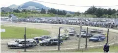  ??  ?? All revved up . . . Cars hurtle round a bend during a Heat 1 Qualifiers Cleanways Group event at Beachlands Speedway, Dunedin, yesterday.