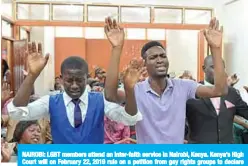  ?? —AFP ?? NAIROBI: LGBT members attend an inter-faith service in Nairobi, Kenya. Kenya’s High Court will on February 22, 2019 rule on a petition from gay rights groups to declare two laws that effectivel­y criminaliz­e homosexual­ity, unconstitu­tional.