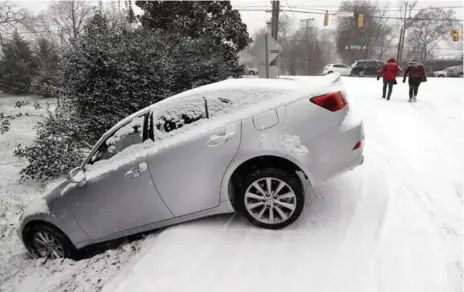  ?? MARK HUMPHREY/THE ASSOCIATED PRESS FILE PHOTO ?? You can never be too prepared when it comes to winter driving. Doug Herbert recommends keeping a small emergency bag — it can help in any occasion.