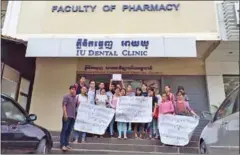  ?? PHOTO SUPPLIED ?? Internatio­nal University students protest outside the Faculty of Pharmacy in Phnom Penh after they were told their recently acquired associate’s degrees did not entitle them to open pharmacies.