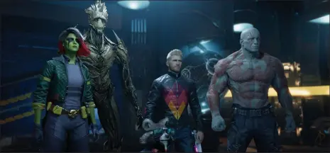  ?? Square Enix/ Courtesy photo ?? While Rocket and Groot pretty much look the same, Starlord, Gamora and Drax all look markedly different, much closer to the comic book designs in "Guardians of the Galaxy."