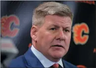  ?? THE CANADIAN PRESS/JEFF MCINTOSH ?? New Calgary Flames' head coach Bill Peters speaks to the media in Calgary, Monday.