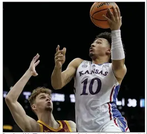  ?? (AP/Charlie Riedel) ?? Kansas forward Jalen Wilson (right) shoots over Iowa State forward Aljaz Kunc during the second half of the No. 3 Jayhawks’ 71-58 victory over the Cyclones at the Big 12 Tournament in Kansas City, Mo.