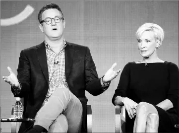  ?? — AFP file photo ?? Host Scarboroug­h and co-host Brzezinski speaking onstage during the ‘Morning Joe’ panel during the NBCUnivers­al portion of the 2012 Winter TCA Tour on Jan 6, 2012 in Pasadena, California.