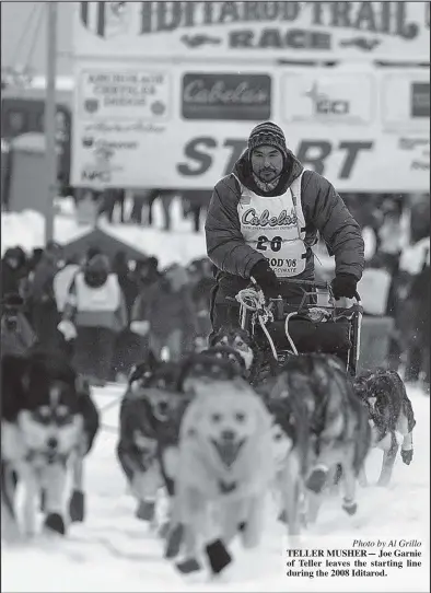  ?? Photo by Al Grillo ?? TELLER MUSHER— Joe Garnie of Teller leaves the starting line during the 2008 Iditarod.