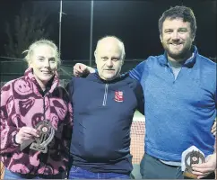  ?? (Pic: Sean Burke) ?? Mitchelsto­wn Tennis Club Supervalu sponsored club finals, chairperso­n, Fred Dollion with grade 5 winners, Nollaig Baker and Ciaran Cotter.