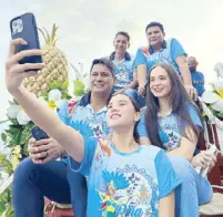  ?? ?? Ormoc City Mayor Richard Gomez, his wife Rep. Lucy Torres Gomez and their daughter Juliana with Ormoc Vice Mayor Leo Carmelo Locsin Jr. and board member Vince Rama join the Piña Festival parade. Richard is now the congressma­n of the fourth district of Leyte while Lucy is the mayor of Ormoc.