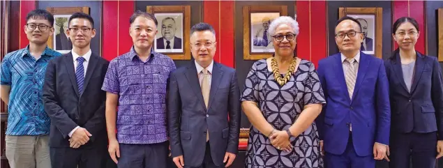  ?? Photo: Government of Samoa ?? Chinese Government Special Envoy for Pacific Island Countries Qian Bo (fourth from left) next to Samoa’s Prime Minister Fiame Naomi Mataafa with Chinese Embassy officials at the Office of the Prime Minister in Apia on April 24, 2023.