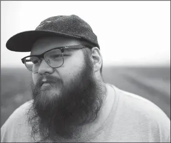  ?? COURTESY PHOTO ?? Alternativ­e country singer and songwriter John Moreland returns to Fayettevil­le for his first headlining show at George’s on Tuesday. The Roots Festival alum — one of his favorite festivals to play — released his new album “Big Bad Luv”