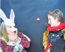  ?? South Shore Players ?? The White Rabbit (Amelie Leefe) and The Queen of Hearts (Megan Spencer) rehearse a scene from The Caterpilla­r Tales. The “musical romp through wonderland” is the South Shore Players annual Christmas production this year. Being held at the Lunenburg Community Centre at 19 Green St.