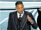  ?? ?? Will Smith slapped Chris Rock for a GI Jane joke directed at his wife.