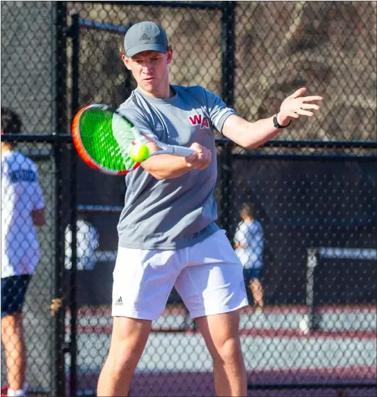  ?? JAMES THOMAS PHOTO ?? Westford’s Connor Liona rips a nice forehand volley back to opponent Nick Narina of Andover. Liona won the No. 1singles match and Westford pulled out to a tough 3-2non-league victory on Tuesday afternoon in Westford.