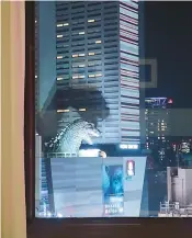  ?? ?? A Tokyo room with a view — of Godzilla.