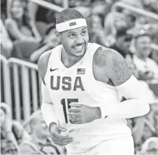  ?? JOSHUA DAHL, USA TODAY SPORTS ?? “I get a chance to go out there, be the leader of the team and enjoy it,” says Carmelo Anthony, a two-time gold medalist.