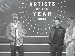  ?? NICOLE HESTER/ USA TODAY NETWORK ?? Walker Hayes accepts his award during the CMT Artists of the Year at Schermerho­rn Symphony Center in Nashville, Tenn., on Oct. 12, 2022.