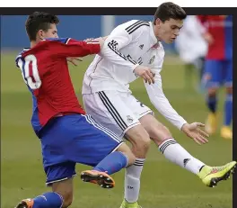  ??  ?? Cultured: Harper (right) is starring for Real Madrid youths