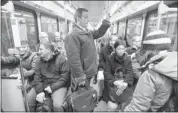  ??  ?? Passengers packed into a car to ride the new West LRT line from the 69th Street Station to downtown.