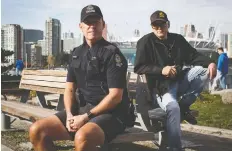  ?? DARRYL DYCK FOR NATIONAL POST ?? Vancouver police officer Rob Brunt, left, and 529 Garage founder J (James) Allard have teamed up on Allard’s digital war on bike theft using his free, smartphone app/online bike registry.