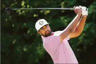  ?? Nathan Denette / Associated Press ?? Tony Finau hits his tee shot on the 17th hole during Saturday’s third round of the Canadian Open.