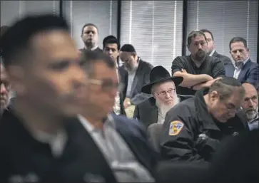  ?? Photograph­s by Allen J. Schaben Los Angeles Times ?? HATZOLAH SUPPORTERS attend a license hearing last month in Santa Fe Springs. The group has faced pushback from the city Fire Department, the exclusive provider of emergency ambulance services in L.A.