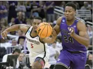  ?? PHELAN M. EBENHACK/THE ASSOCIATED PRESS ?? San Diego State guard Lamont Butler, left, steals the ball from Furman forward Alex Williams during Saturday’s game in Orlando, Fla.