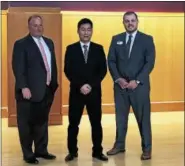  ?? SUBMITTED PHOTO - LORI B. DONOFRIO-GALLEY ?? Pictured at the Northeast Berks Chamber of Commerce Economic Forecast Breakfast at Kutztown University in January are Timothy Snyder, President, Fleetwood Bank; Ryotaro Tashiro, Economic & Public Outreach Associate, Federal Reserve Bank of...