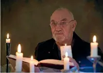  ?? PHOTO: MURRAY WILSON/FAIRFAX NZ ?? Linton resident Arne Evans got so used to power cuts, he has a table with three candelabra and an LED torch at the ready.