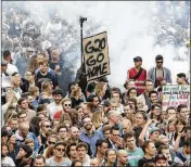  ?? MATTHIAS SCHRADER / ASSOCIATED PRESS
©2017 New York Times ?? Demonstrat­ors hold a “G20 Go Home” sign during a protest Wednesday in Hamburg, Germany, site of the Group of 20 summit meeting scheduled for Friday and Saturday.