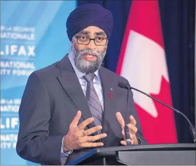  ?? CP PHOTO ?? Canadian Defence Minister Harjit Sajjan fields questions at a news conference at the Halifax Internatio­nal Security Forum in Halifax on Friday.