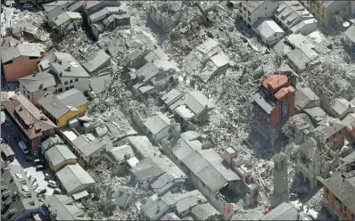  ?? GREGORIO BORGIA / ASSOCIATED PRESS ?? An aerial view of Amatrice, Italy, on Wednesday, after a magnitude-6.2 earthquake.